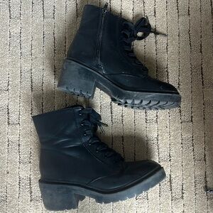 Zip up black combat boots